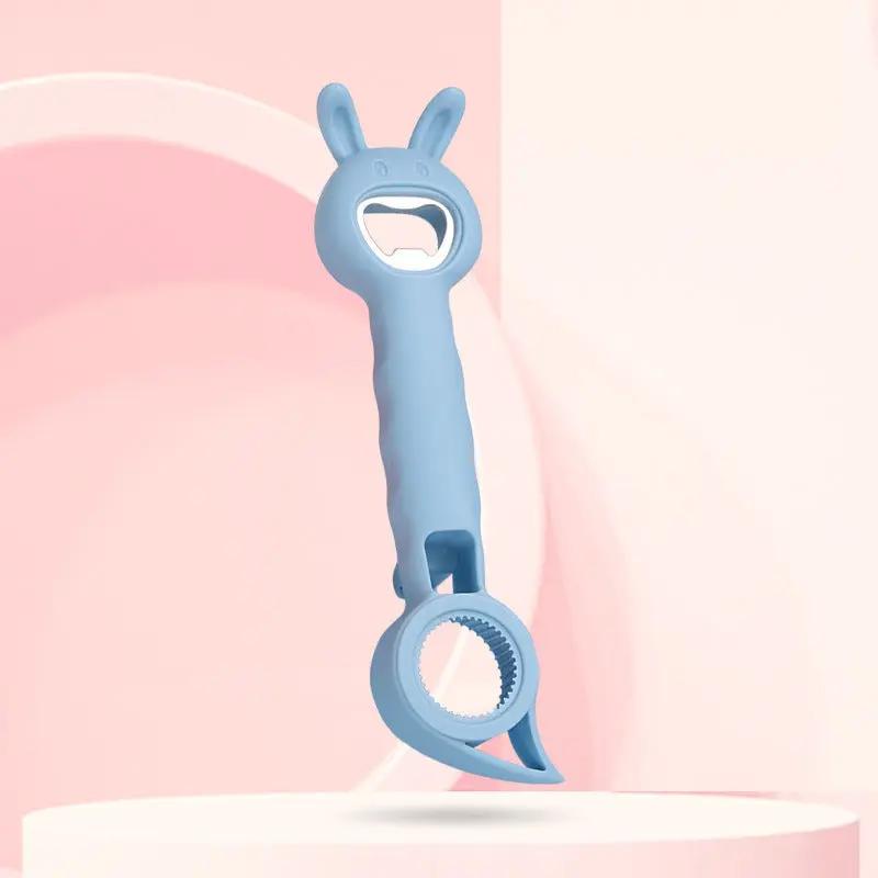 Blue bottle opener with rabbit ears on a pink background
