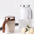 Two ceramic mugs with handles on a white background