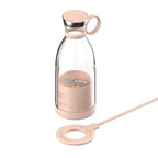 Clear glass bottle with pink base and cap on a white background