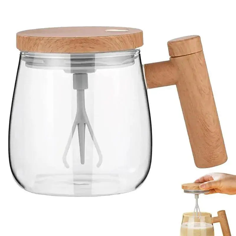 Clear glass container with wooden lid and handle, featuring a whisk inside, on a white background.
