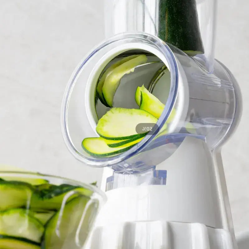 Spiralizer with zucchini slices on a white background