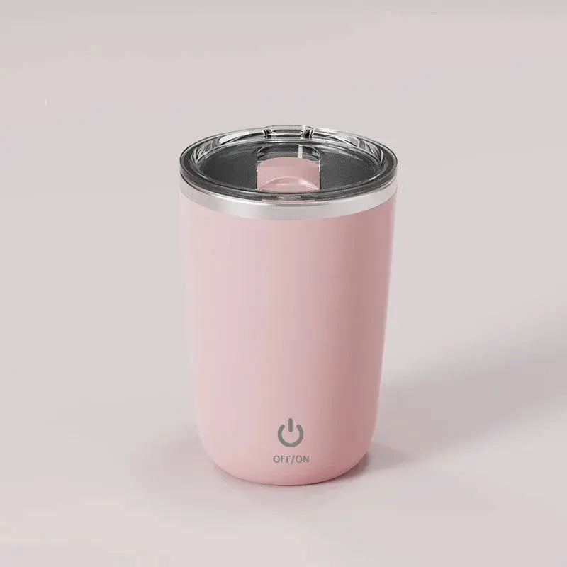 Pink insulated tumbler with a silver lid on a light gray background