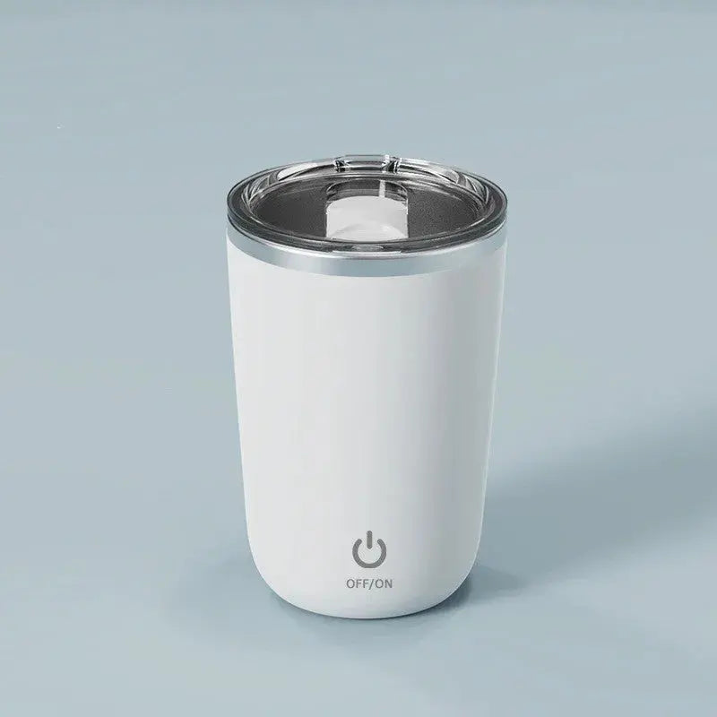 White tumbler with a clear lid on a light gray background