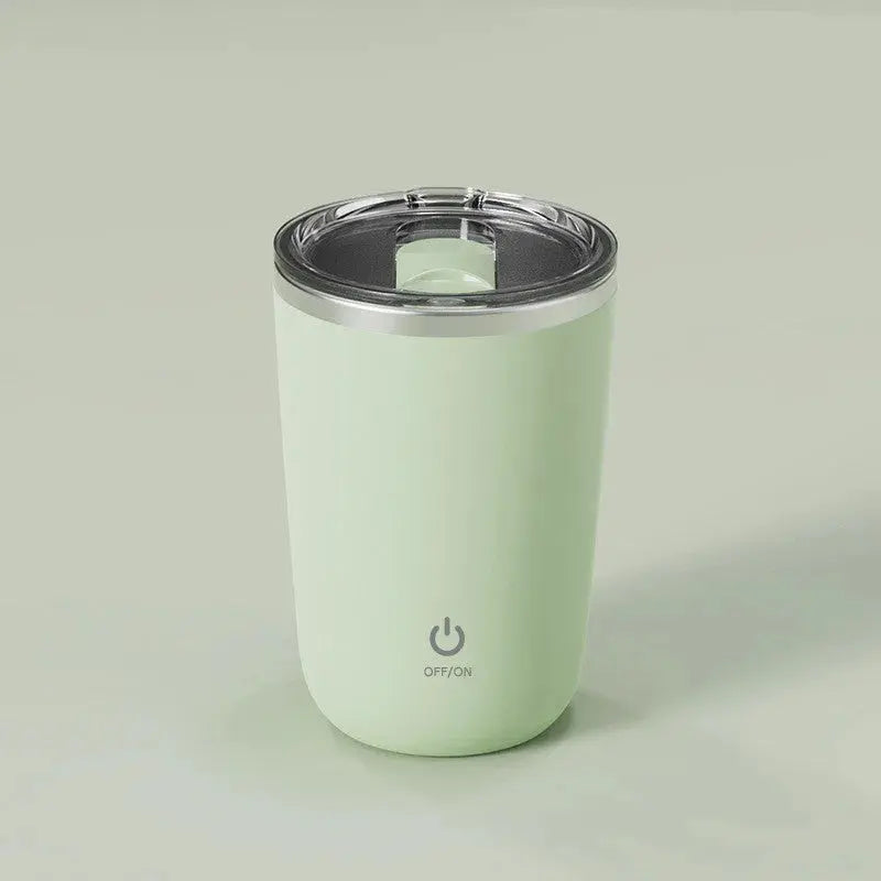 Mint green tumbler with a silver lid on a light gray background