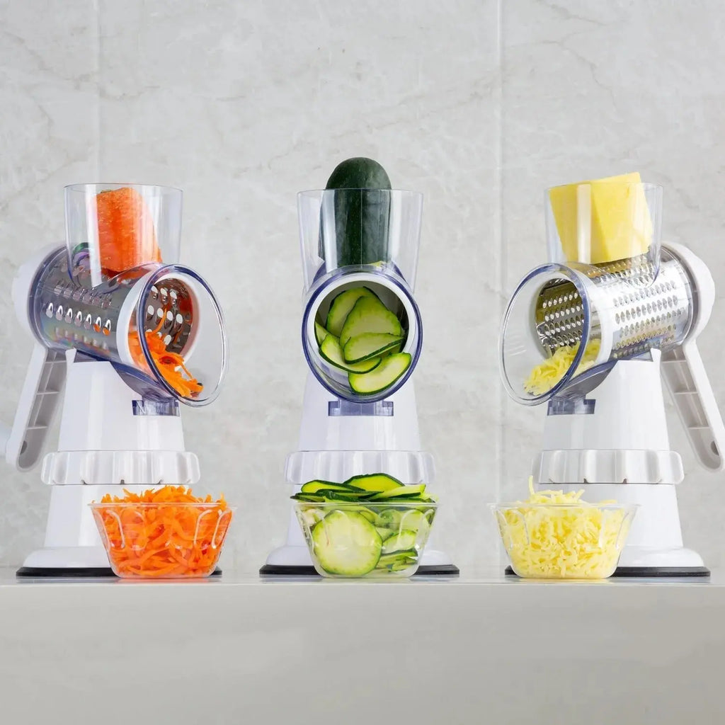 Multifunctional kitchen tool with three attachments for slicing, dicing, and grating vegetables on a white background.
