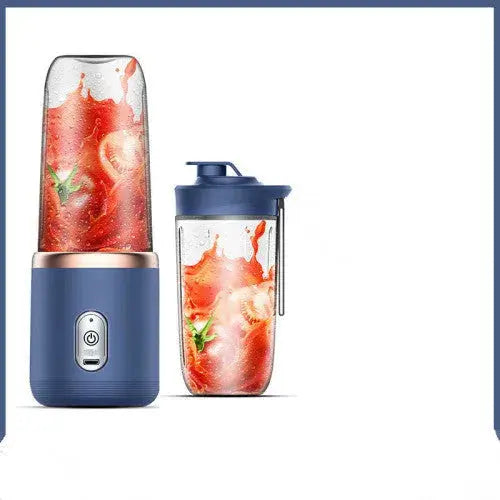 Blue portable blender with a glass container filled with a red smoothie on a white background