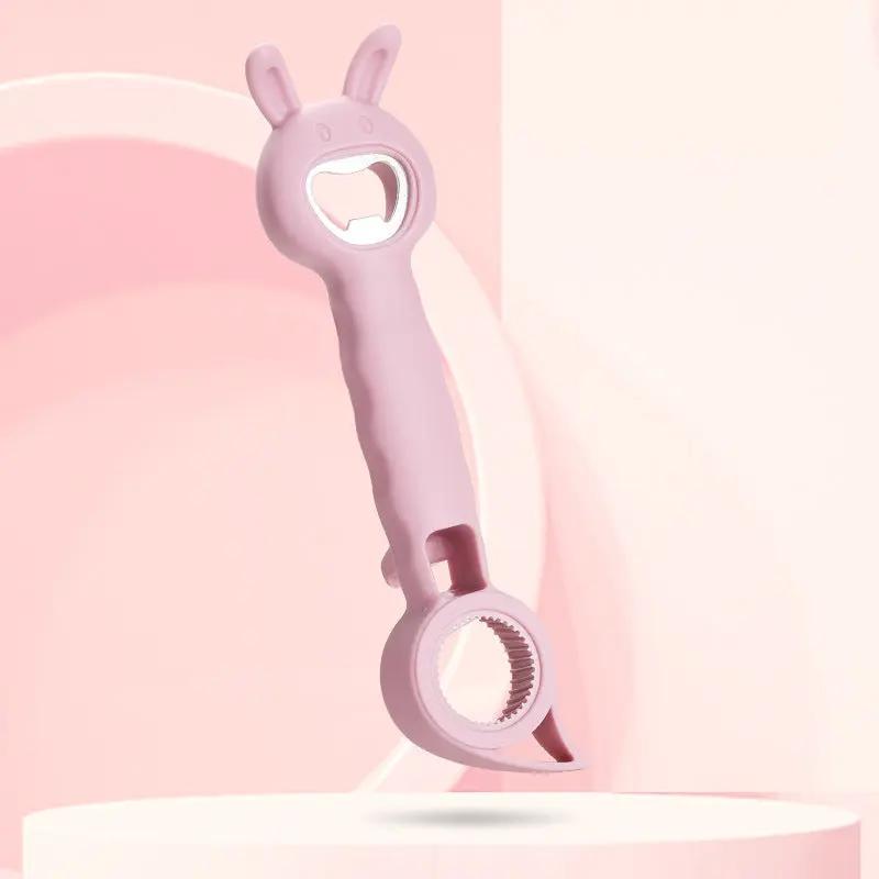 Pink bottle opener with rabbit ears on a pink background