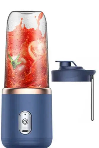 Blue portable blender with a glass container filled with a red smoothie on a white background